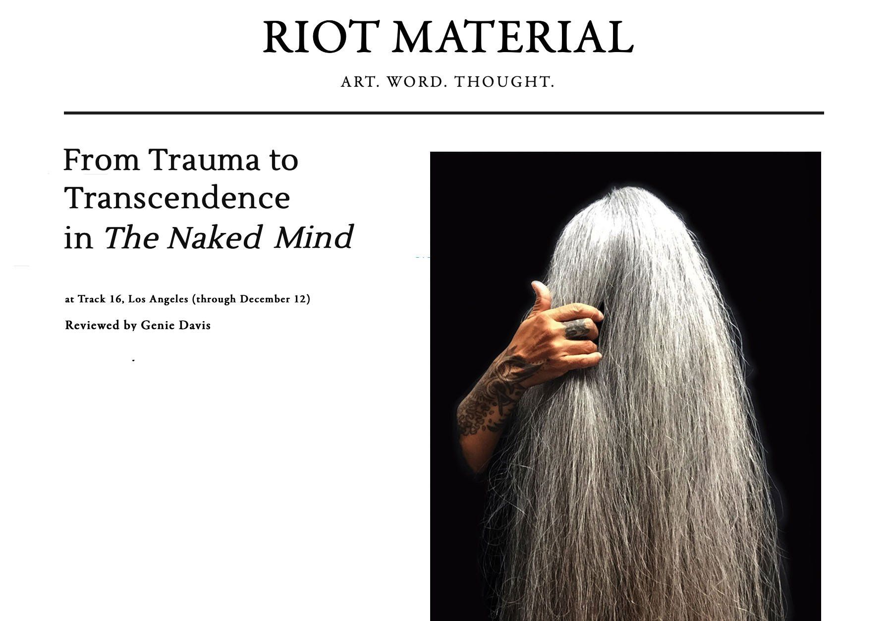 A riot material article with a picture of a person 's hair
