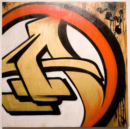A painting of a letter k in a circle