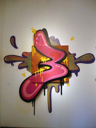 A graffiti painting of the letter b on a wall