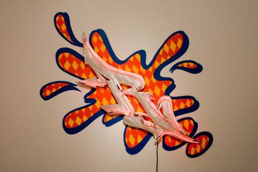 A painting on a wall that looks like a flamingo