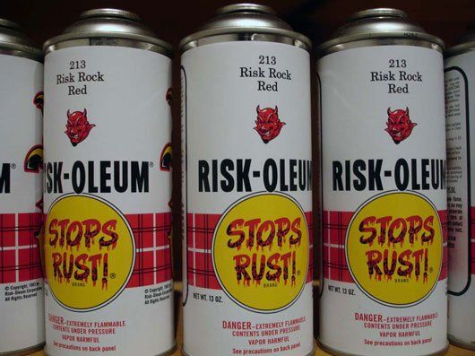 A row of cans of risk-oleum stops rust