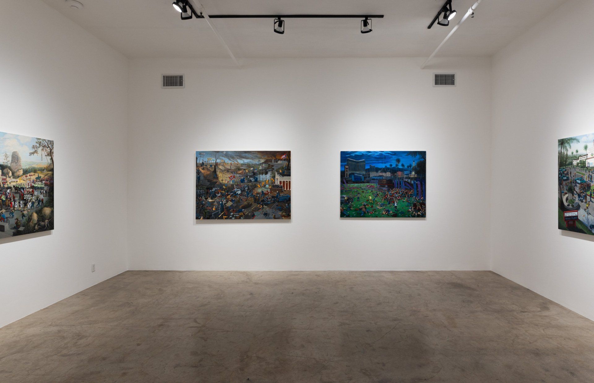 There are three paintings on the wall in this room.