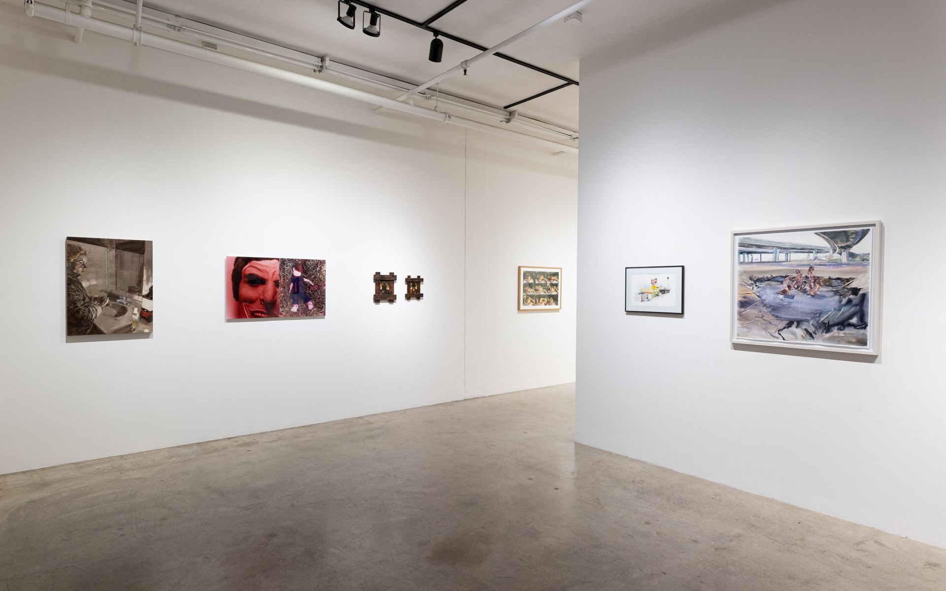 Art gallery interior with framed contemporary artworks on white walls and polished concrete floor. Summer Bullet Sings, an exhibition of thirty-five artists organized by gallery director Sean Meredith and curator Diana Sardaryan.