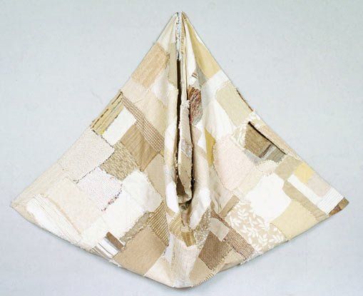 A piece of cloth is folded into a triangle shape