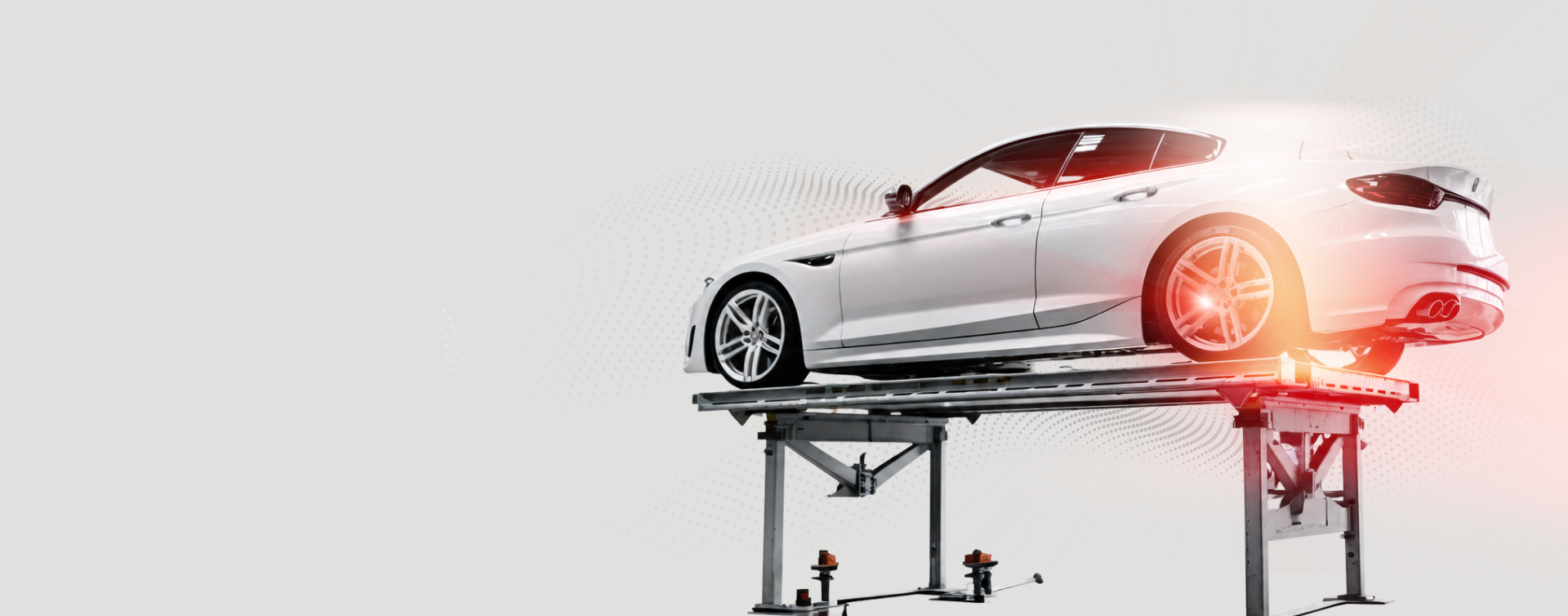 White sports coupe with red accents and large DeWitt's text on a light gray background | Dewitt's Automotive Center