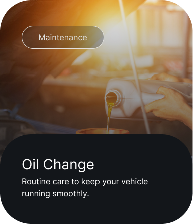 Oil Change service card with a mechanic hand and warm orange car interior background | Dewitt's Automotive Center