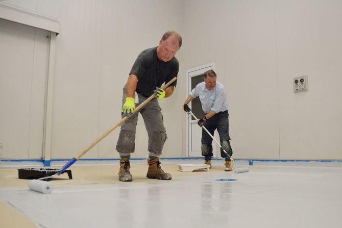 Grey and blue flake epoxy garage floor coating.