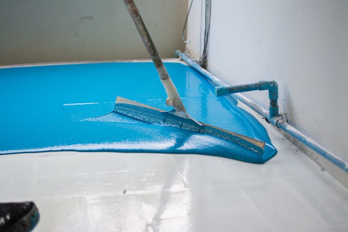 Blue and grey flake epoxy garage floor.