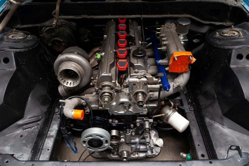 A Close Up Of A Car Engine With A Turbo — Gympie Diesel & Dyno Centre in Glanmire, QLD