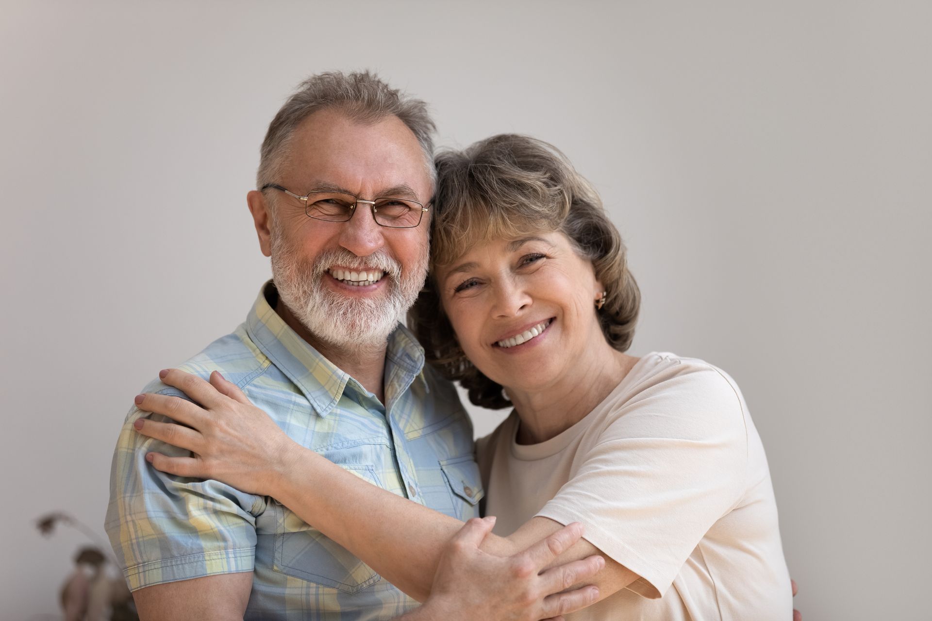 Smiling couple embracing