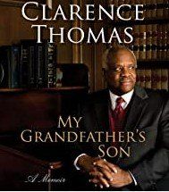 Book cover of “Clarence Thomas: My Grandfather’s Son,” with a seated man in a dark suit