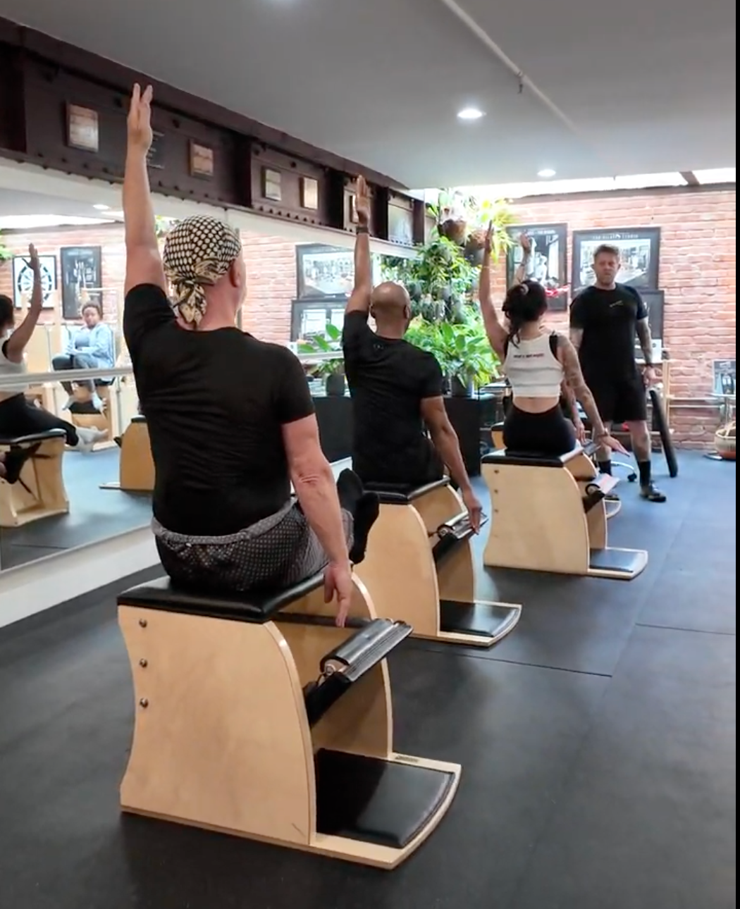 Pilates teachers working together at Breakthrough Pilates