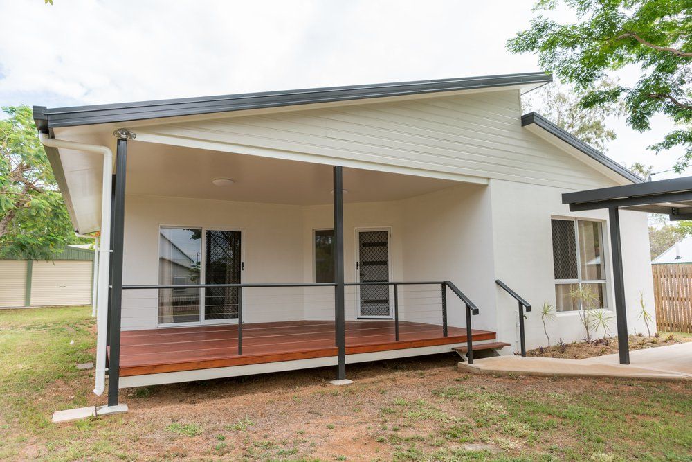 New contemporary style home with timber deck in front — New Homes in Wamberal, NSW