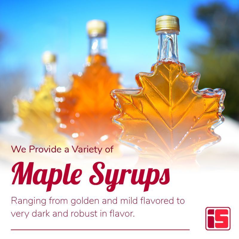 Maple syrup bottles shaped like autumn leaves with text promoting a variety of maple syrups.