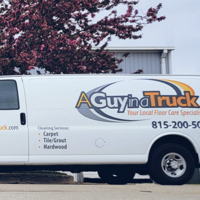 White A Guy in a Truck cleaning van parked outdoors beside a tree