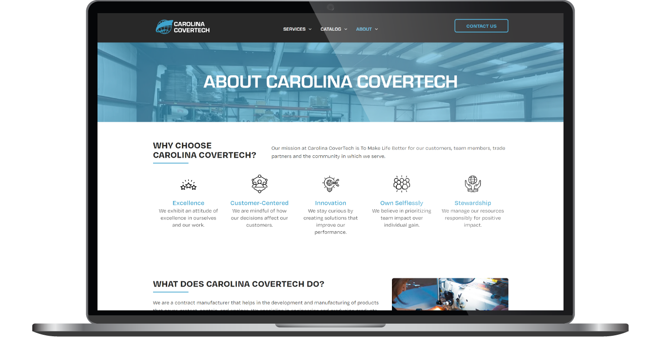 Laptop screen showing a website homepage with a blue “About” banner and navigation menu