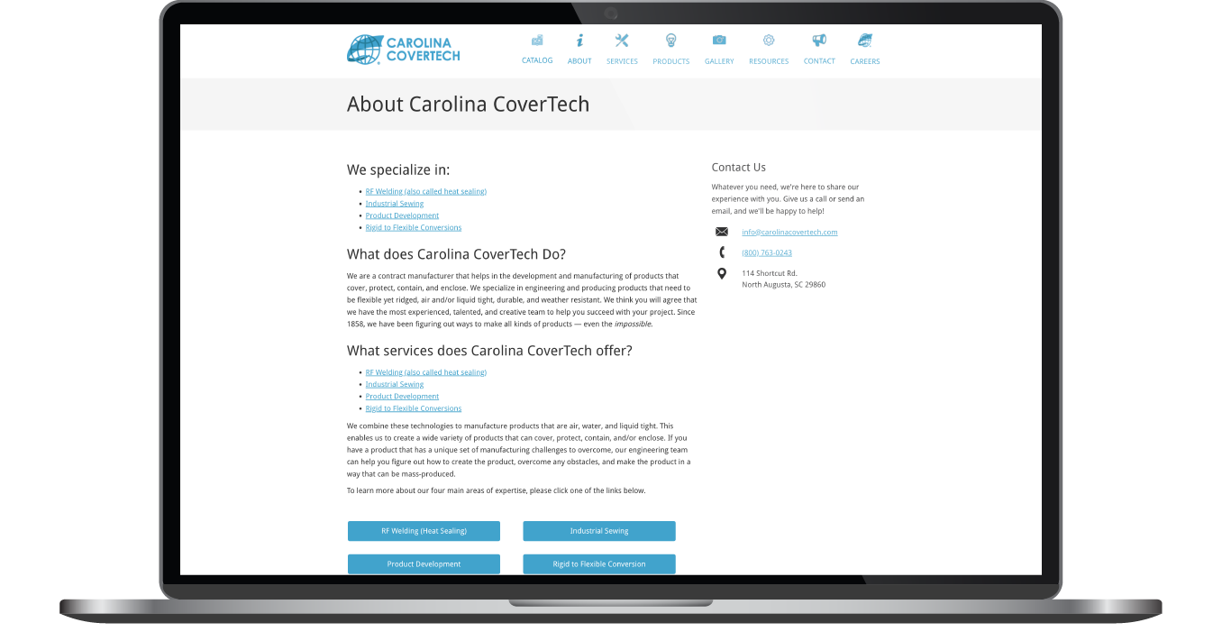 Laptop displaying a clean website homepage with a logo, navigation bar, text sections, and blue buttons