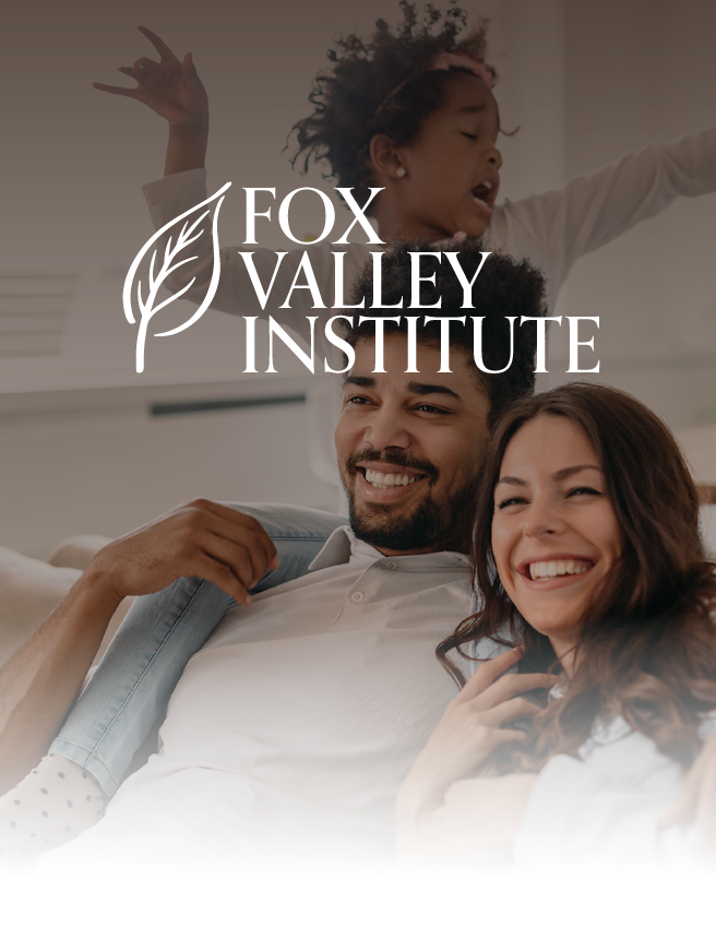 Fox Valley Institute logo over smiling couple and child in a warm, bright scene