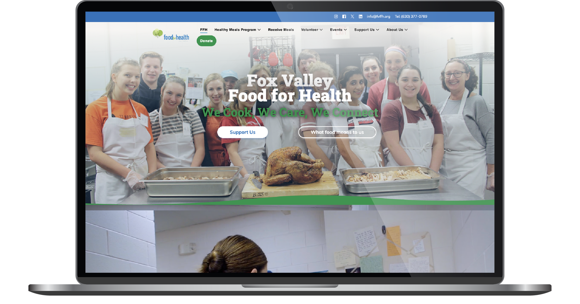 Laptop displaying a house design website with a home photo and “Design Your Dream Home” headline