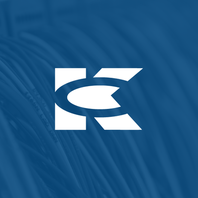 White stylized “K” logo on a blue textured background.