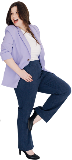 Woman posing in a lavender blazer, white top, and navy pants against a white background