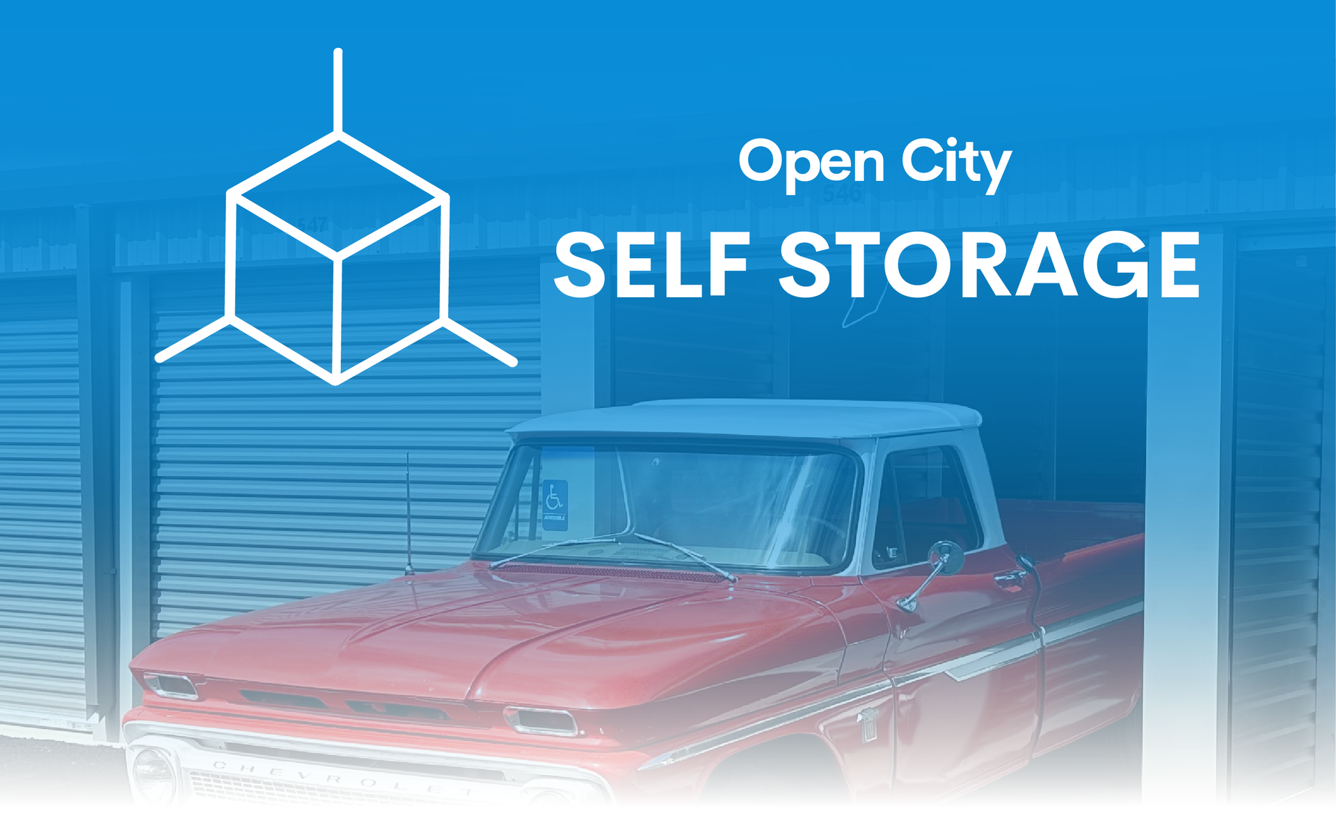 Open City self storage ad with a red pickup truck and white storage icon on blue background