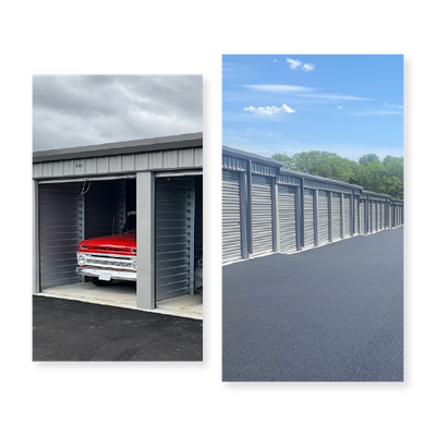 Storage unit row with open bays; one contains a red vehicle, under a cloudy sky.