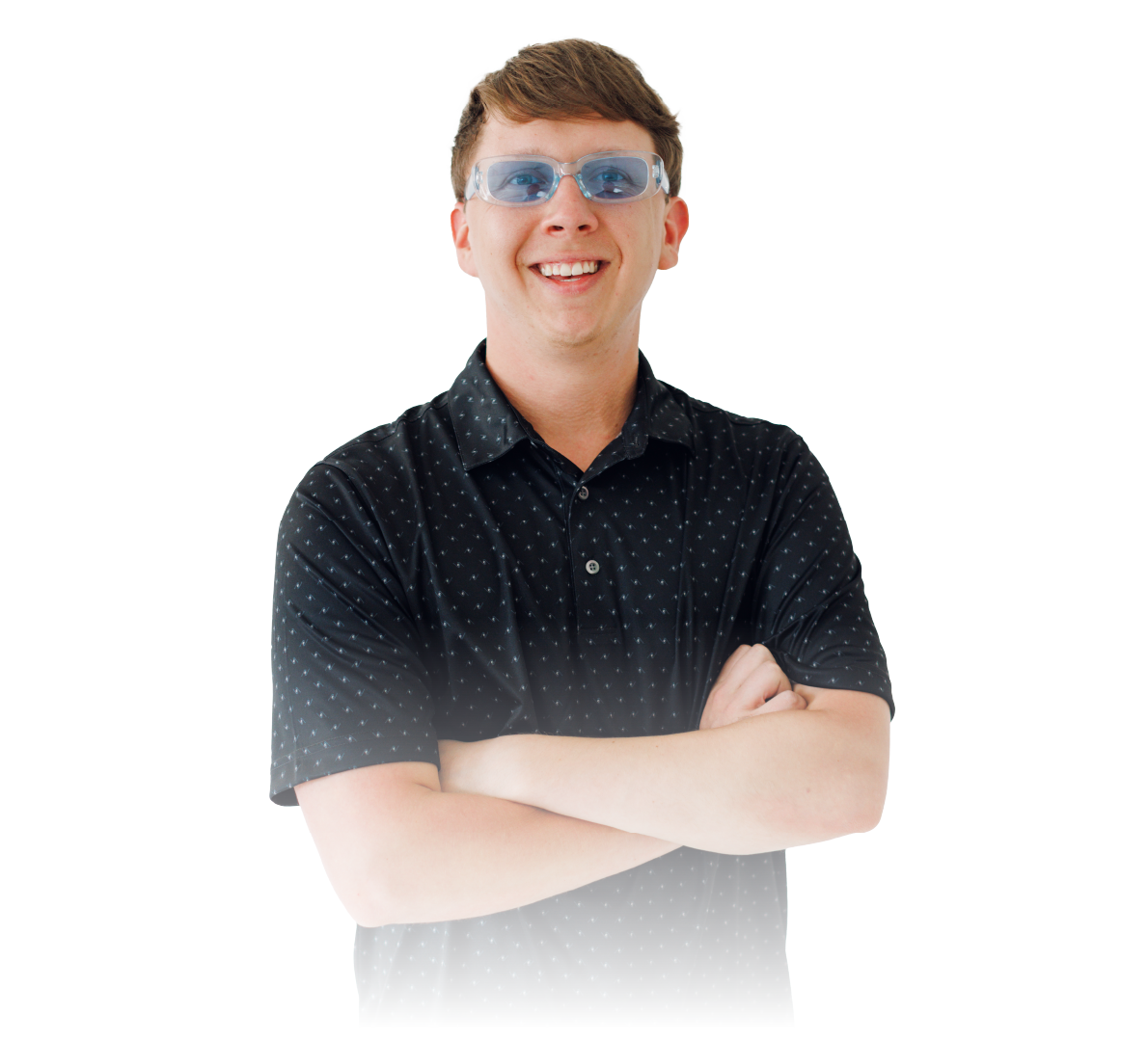Smiling person with glasses and folded arms, wearing a dark shirt on a white background
