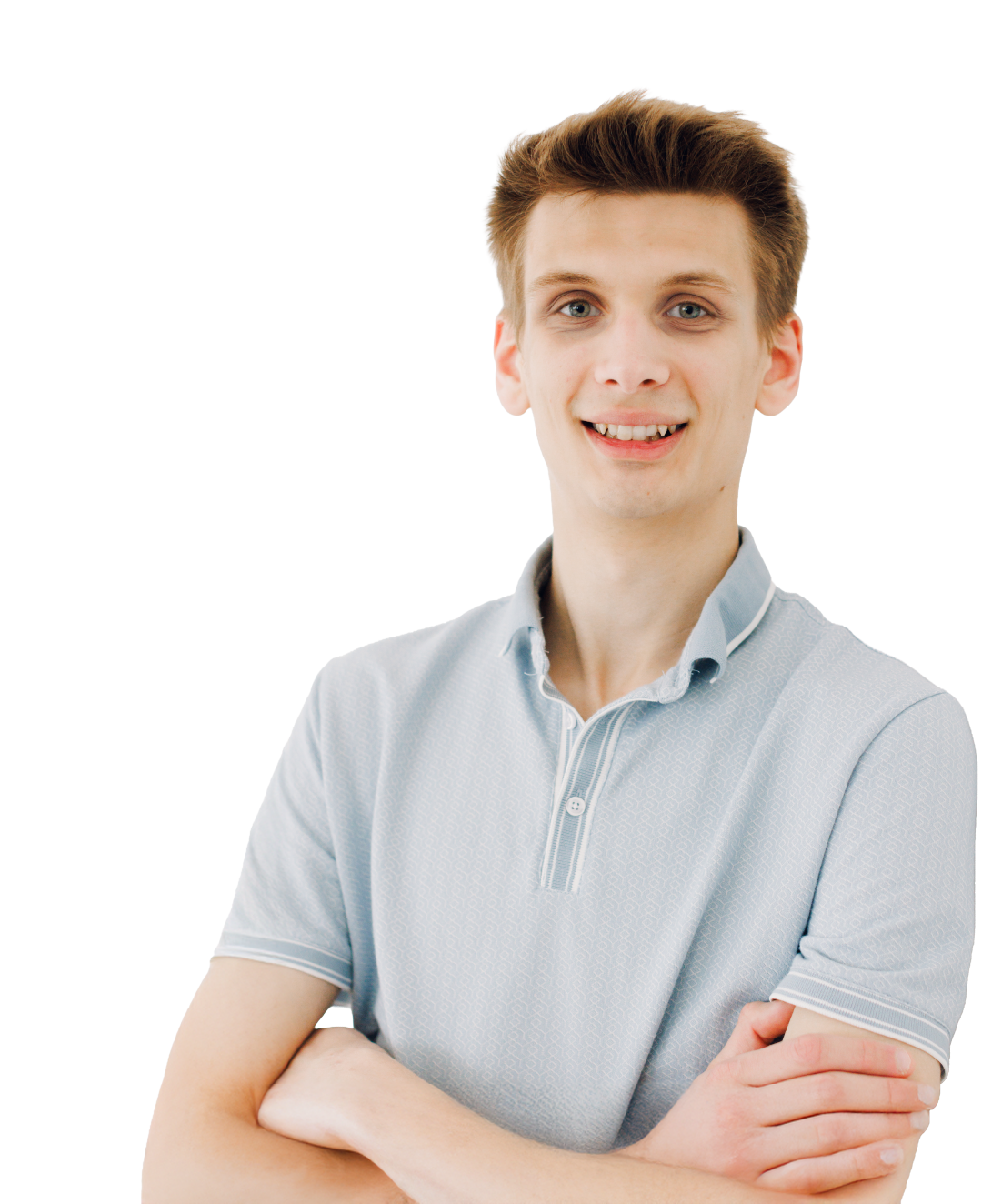 Smiling man in a light blue polo shirt with arms crossed on a white background