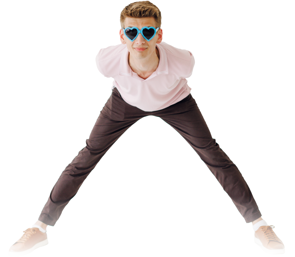 Person wearing blue sunglasses and pink shirt, standing in a wide-legged pose on a white background