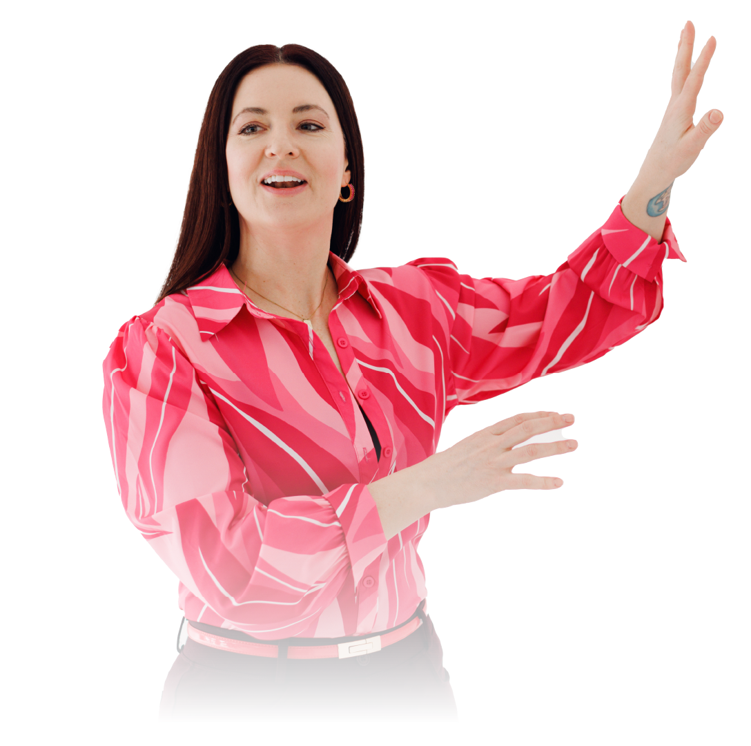 Woman in a bright pink blouse gesturing with raised hands against a white background
