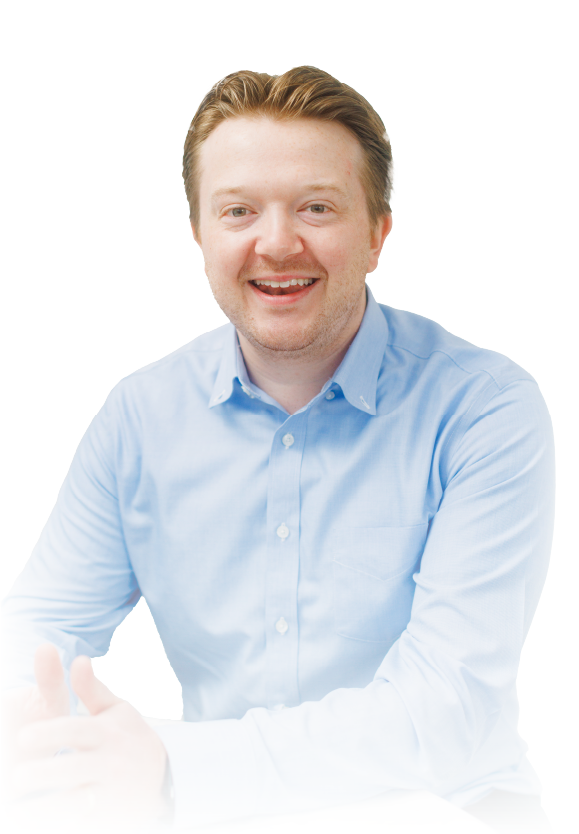Smiling man in a light blue shirt against a white background