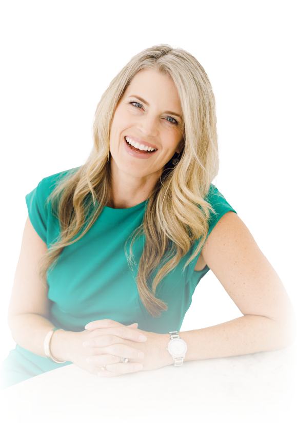 Smiling woman in a teal top with long blonde hair against a white background