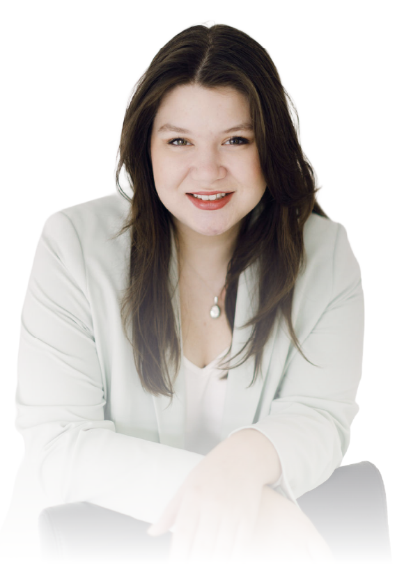 Woman with long dark hair smiling in a light blouse against a white background