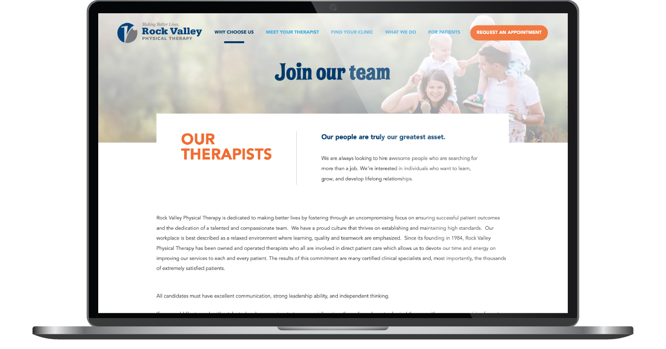 Laptop displaying a website with a blue header, white page, and small text centered on screen