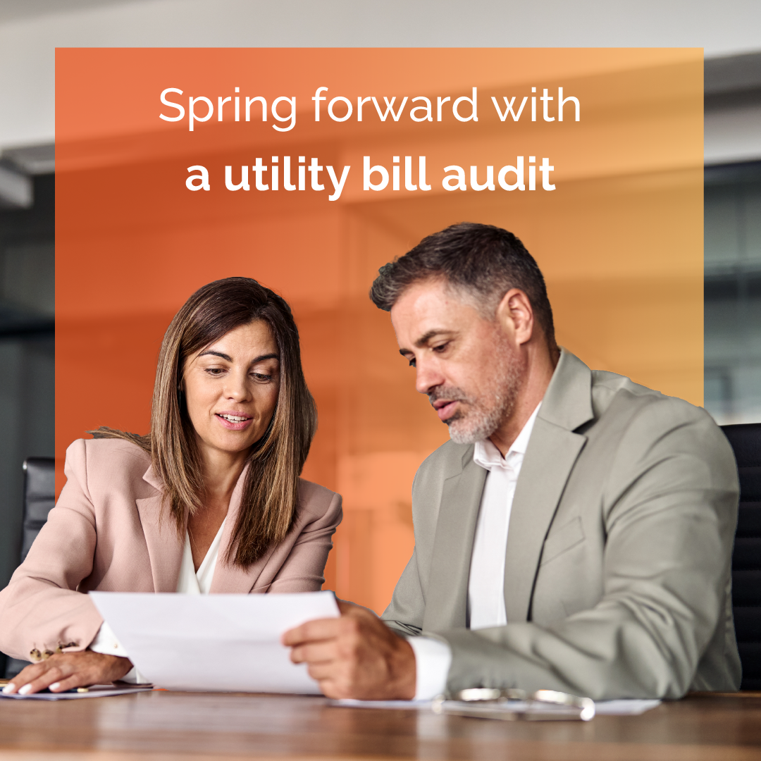 Two people reviewing papers with the text “Spring forward with a utility bill audit” over an orange banner.