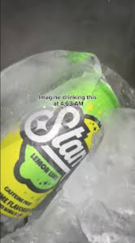 Green lemon-lime drink bottle in ice with a “sour” label and misty background