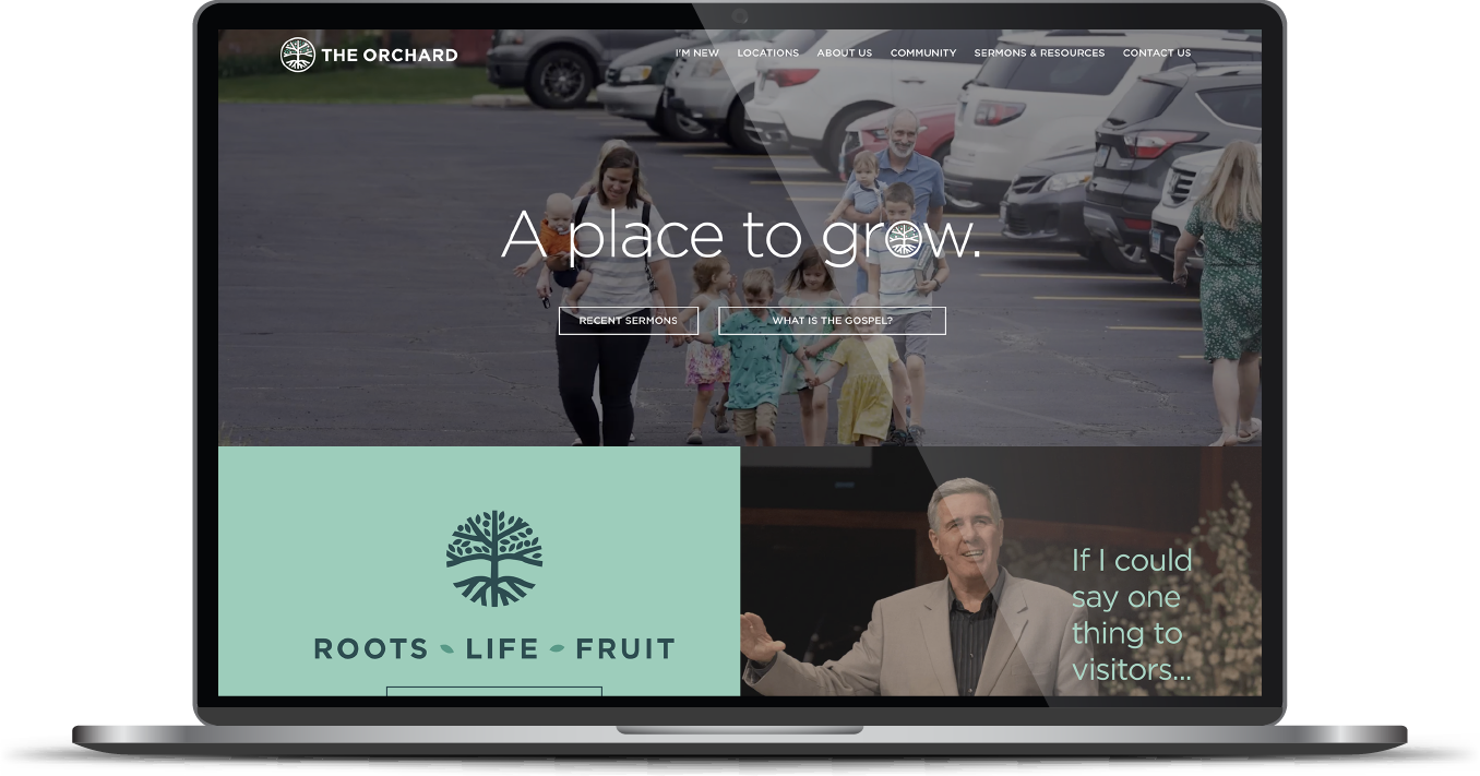 Laptop screen showing a church website with “A place to grow” and “Roots + Life + Fruit” banners.