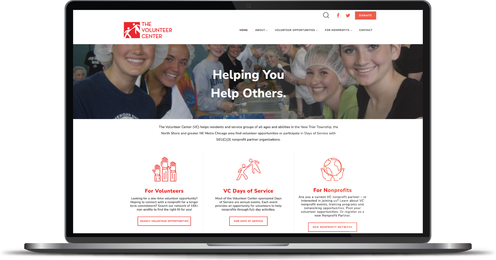 Laptop screen showing a charity website with smiling people and the headline “Helping You Help Others”
