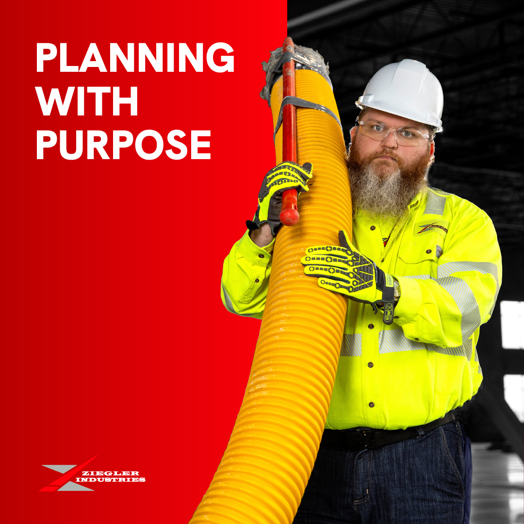 Worker in yellow safety gear holding a large yellow hose beside the text “PLANNING WITH PURPOSE.”