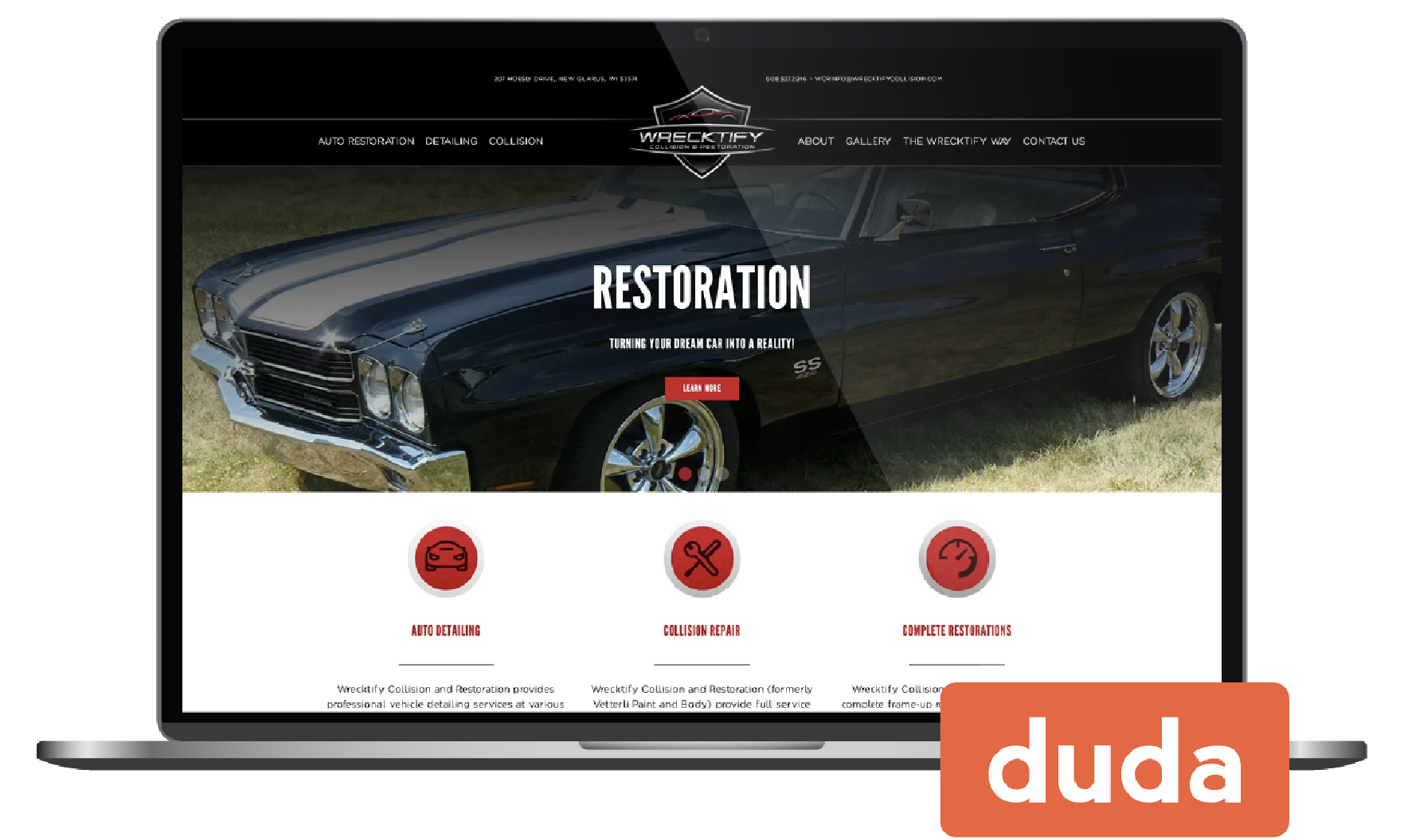 Laptop displaying a car restoration website with a black classic car and red service icons