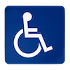 Blue accessibility sign with white wheelchair symbol