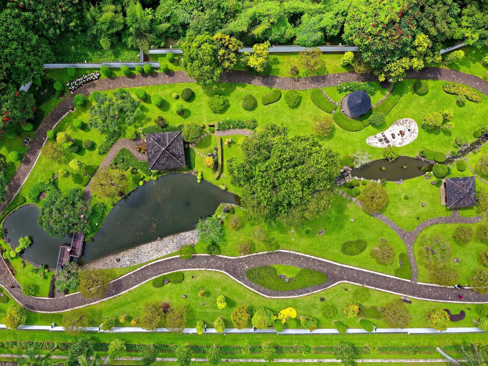 Aerial view of complete backyard design and hardscaping by J Gonzalez Construction in Maryland.