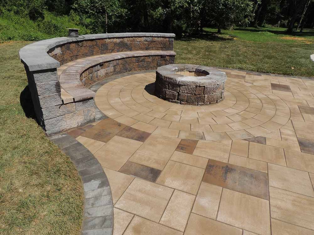 Sitting wall in Maryland with a paver patio installation by J Gonzalez Construction