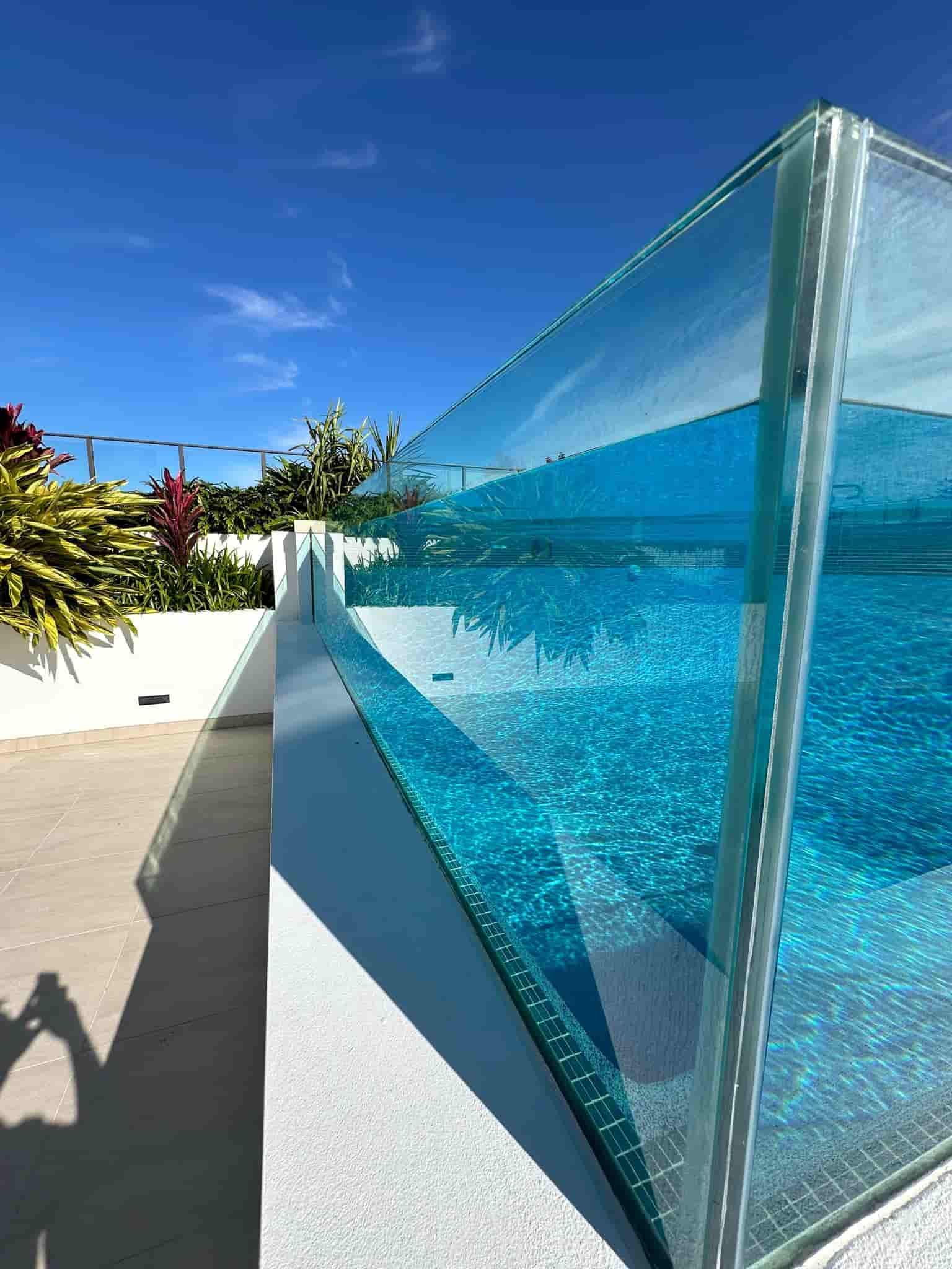 Glass-walled pool with clear blue water — Glass Pool Windows Australia In Mosman, NSW
