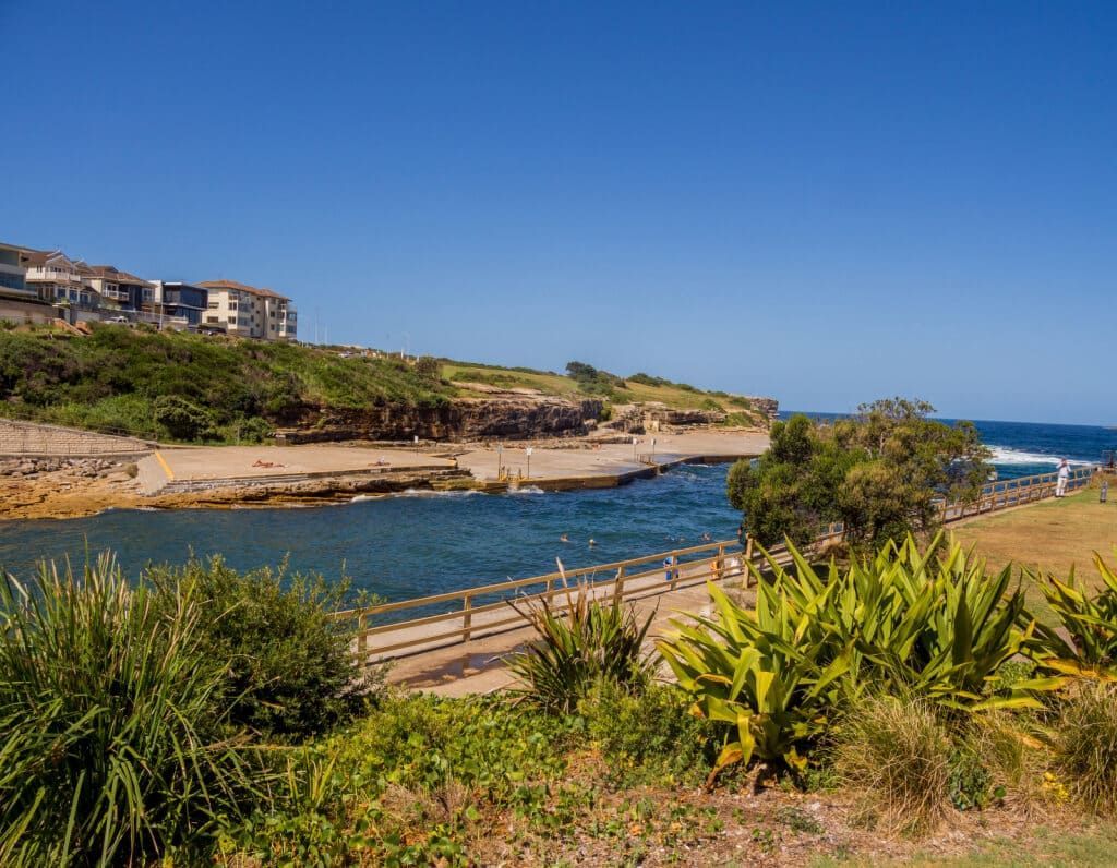 Coastal Scene With a Bright Blue Sky — Glass Pool Windows Australia In Bondi, NSW