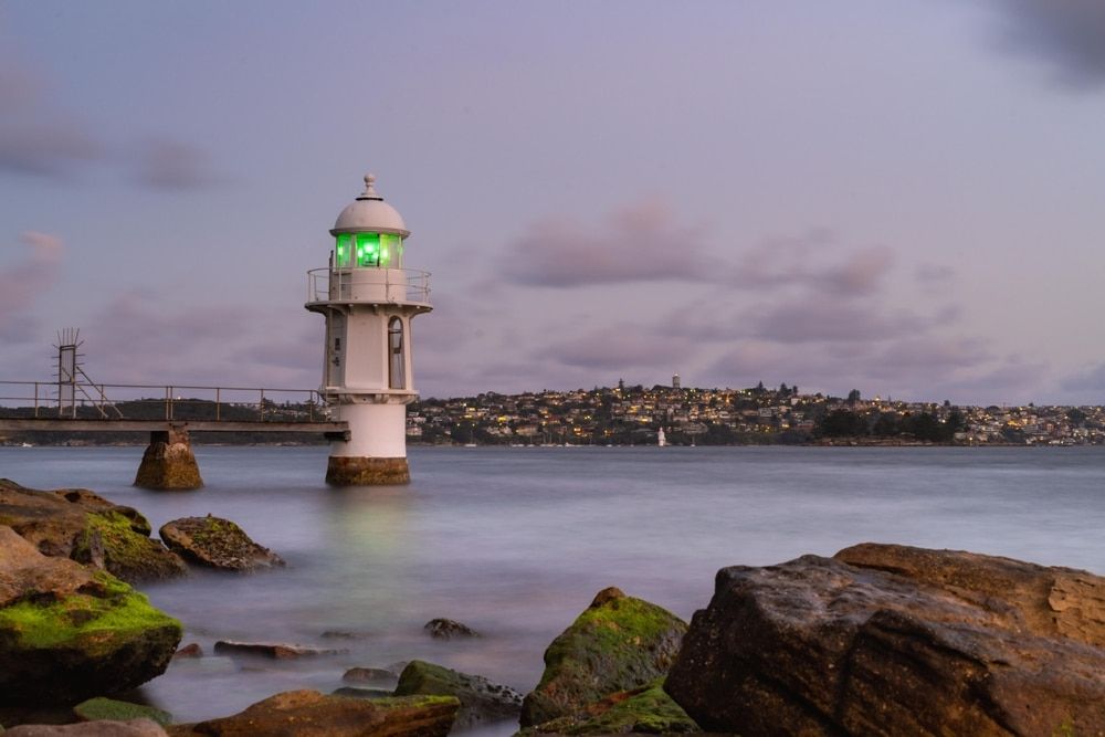 A Lighthouse With a Glowing Green Light — Glass Pool Windows Australia In Mosman, NSW