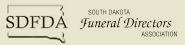 SDFDA logo: South Dakota Funeral Directors Association in dark brown on a beige background.