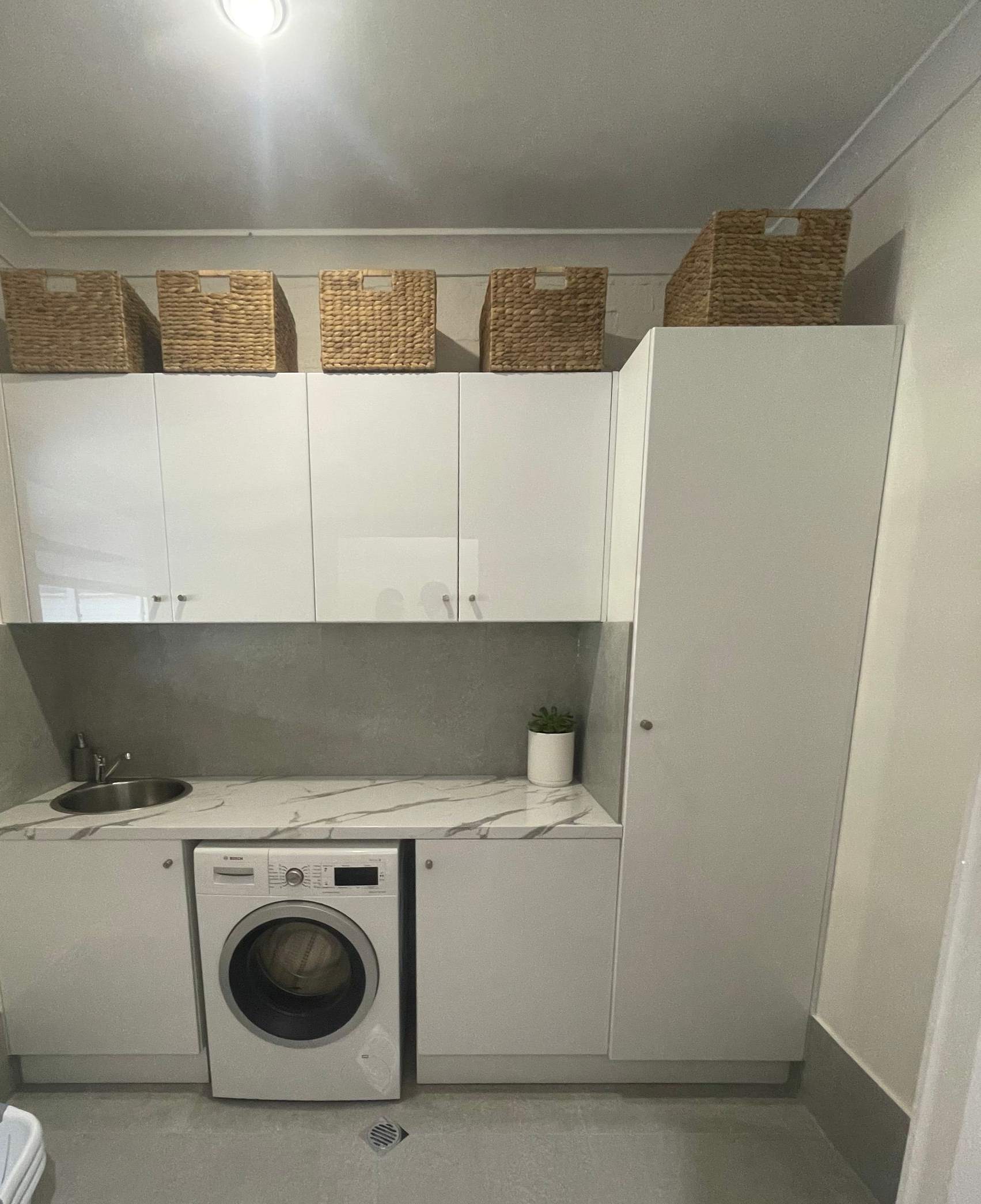 Laundry Room With White Cabinets — Edmonds Bathroom Renovations & Tiling In Laurieton, NSW