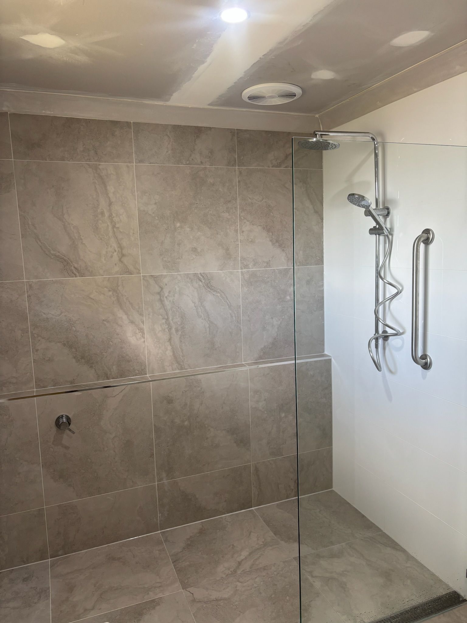 Bathroom With Gray Tiled Walls — Edmonds Bathroom Renovations & Tiling In Laurieton, NSW